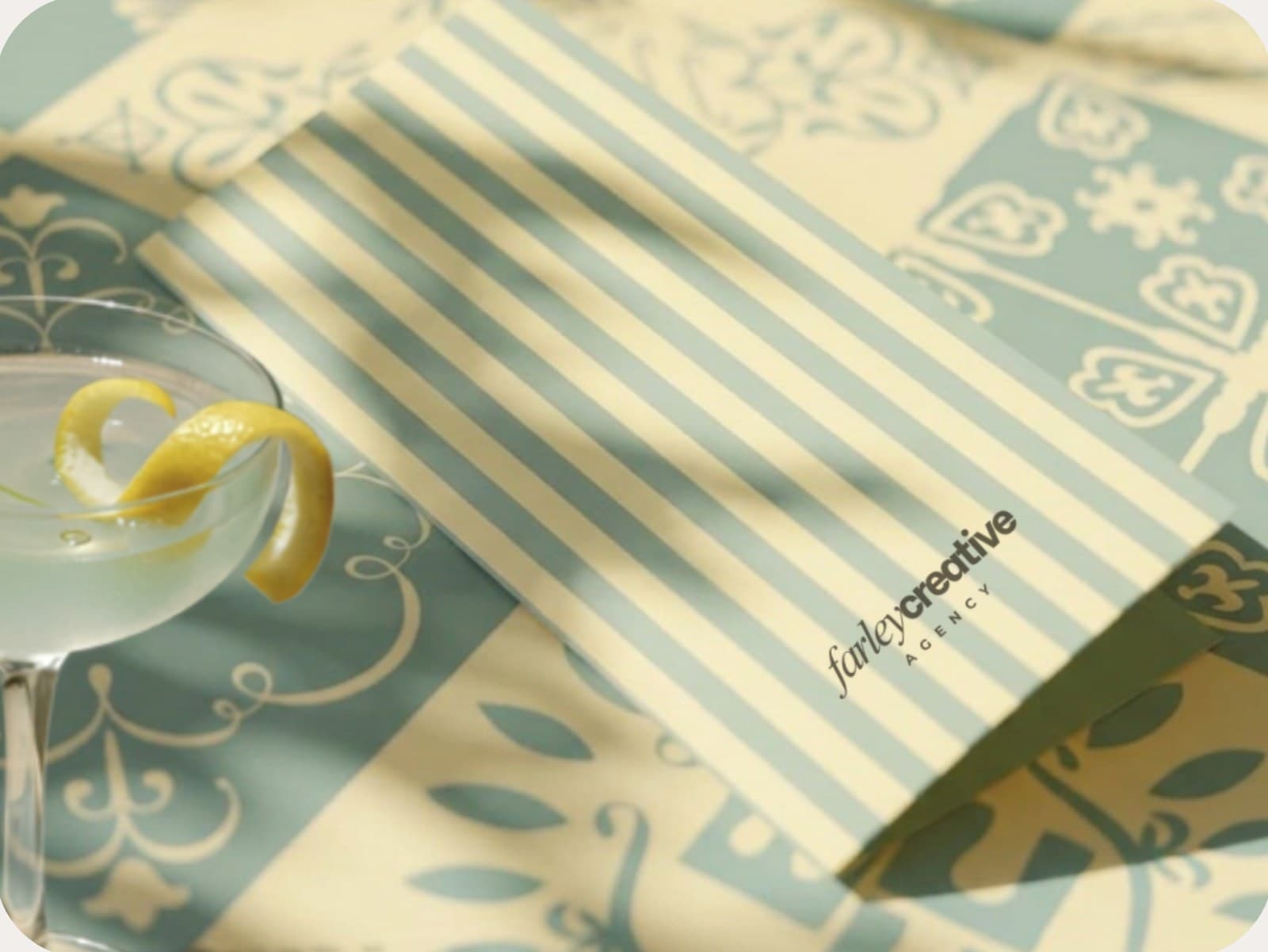 Farley Creative branded napkins and card with a martini glass